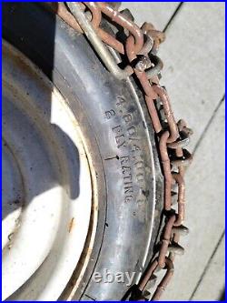 ARIENS ST824 snowblower rim and tire wheel set with tire chains 4.80/4.00-8