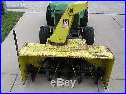 John Deere two stage 47 snow blower and tire chains
